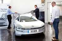 VW XL1 Electric vehicle handover photography